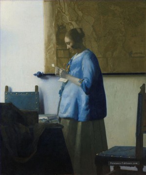 Femme lisant une lettre baroque Johannes Vermeer Peinture à l'huile